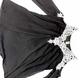 A black lace shirt
